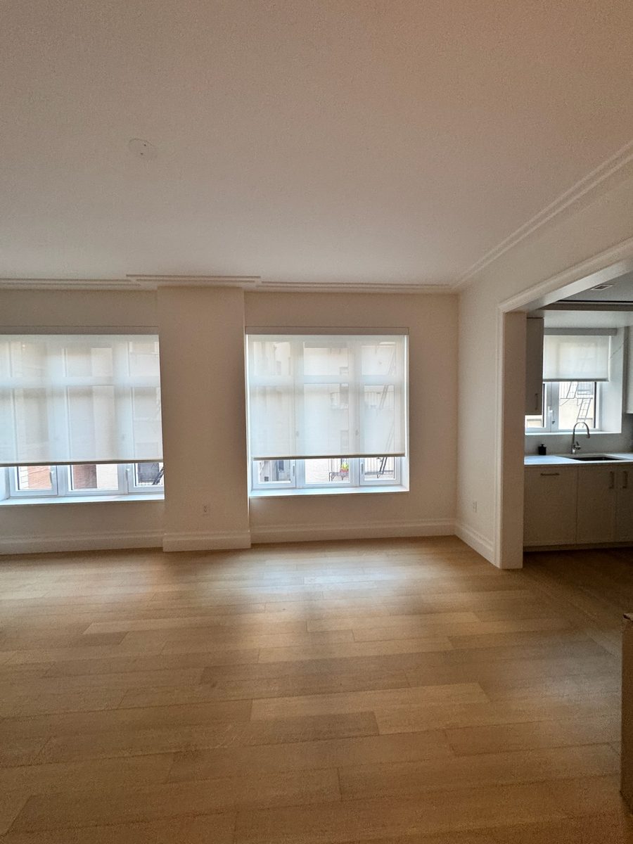 Light filtering roller shades with cassette mount in a finished install